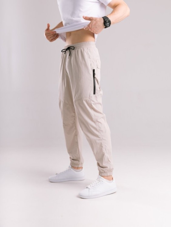 Бежеві чоловічі джогери. Джогери плащівка спорт чоловічі Pobedov Yoxo. Штани джогери з кишенями POB_00000008862