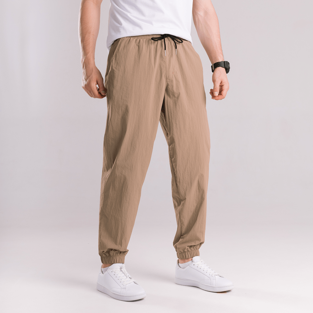 Чоловічі штани джогери з плащівки бежеві з кишенями Pobedov Ground POB_00000008845